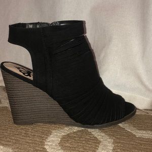 Black wedge booties
